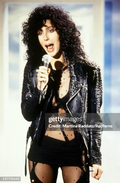 1st OCTOBER: American singer Cher performs live on stage in October 1987.