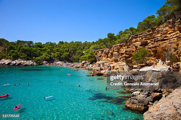 people on the beach. - ibiza island stock pictures, royalty-free photos & images