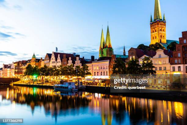 lübeck at sunset - lübeck stock pictures, royalty-free photos & images