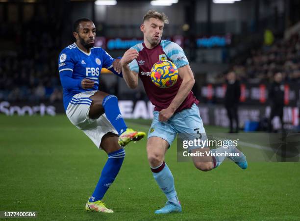 Charlie Taylor of Burnley and Ricardo Pereira of Leicester City in action during the Premier League match between Burnley and Leicester City at Turf...