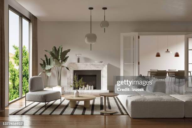 weißes sofa im modernen wohnzimmer zu hause - hängelampe stock-fotos und bilder