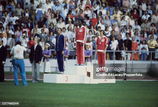 Medal winners, from left, bronze medallist Yevgeniy Gavrilenko of the Soviet Union, gold medallist Edwin Moses of the United States and silver...