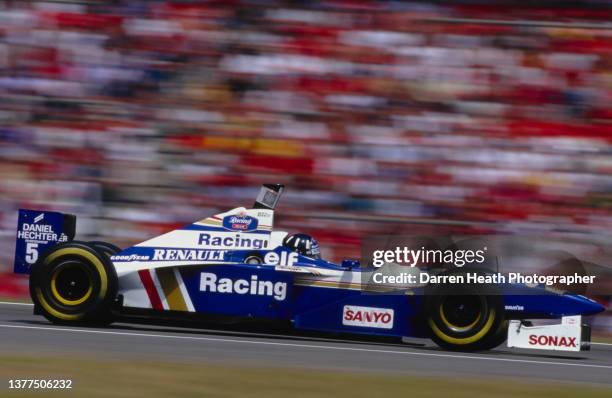 Damon Hill of Great Britain drives the Rothmans Williams Renault Williams FW18 Renault V10 during the Formula One German Grand Prix on 28th July 1996...