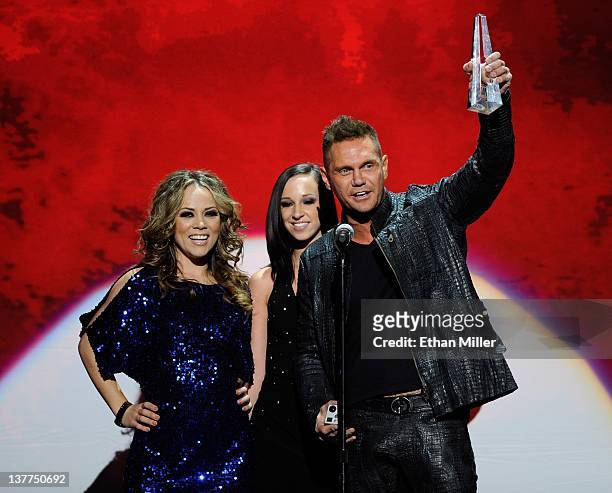 Adult film actresses Kristina Rose and Jada Stevens and adult film actor Nacho Vidal accept an award during the 29th annual Adult Video News Awards...