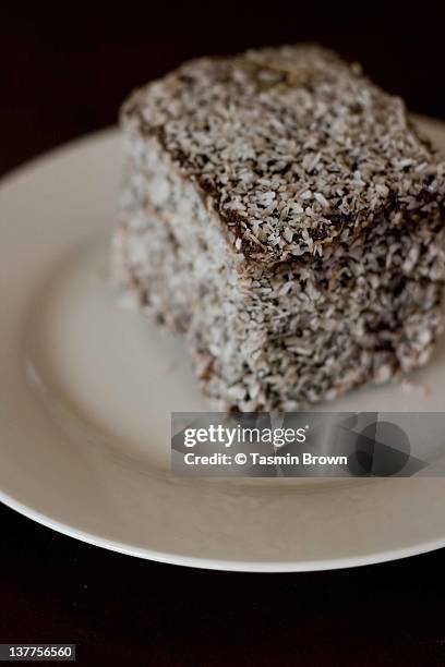 lamington cake square - lamington cake stock pictures, royalty-free photos & images