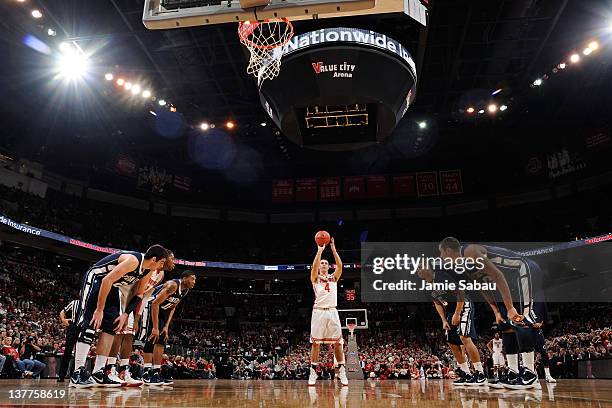 Aaron Craft of the Ohio State Buckeyes shoots a free throw against the Penn State Nittany Lions on January 25, 2012 at Value City Arena in Columbus,...