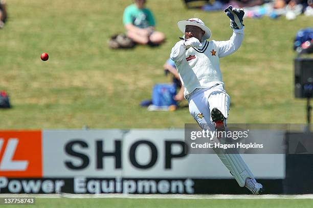 Tatenda Taibu of Zimbabwe fields the ball during day one of the test match between New Zealand and Zimbabwe at McLean Park on January 26, 2012 in...