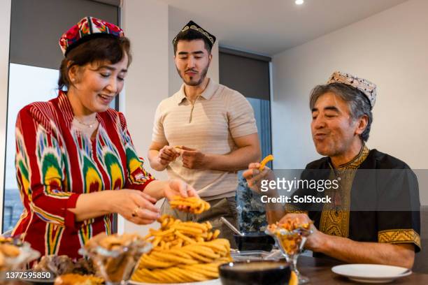 family traditions - uyghurs stockfoto's en -beelden