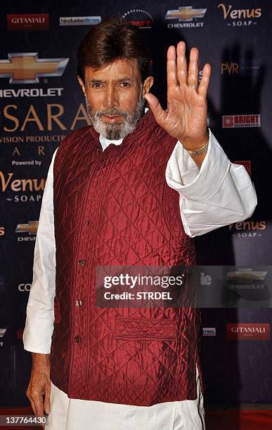 Indian Bollywood actor Rajesh Khanna poses as he arrives for the