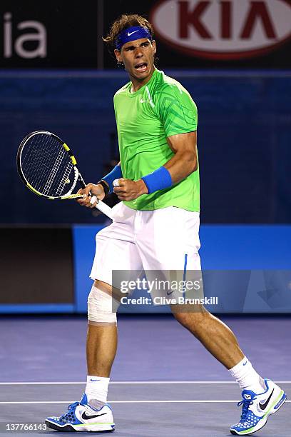 Rafael Nadal of Spain celebrates winning a point in his semifinal match against Roger Federer of Switzerland during day eleven of the 2012 Australian...