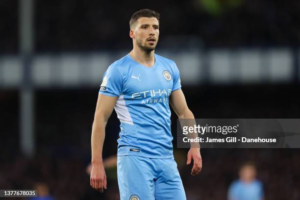 Ruben Dias of Manchester City looks on during the Premier League match between Everton and Manchester City at Goodison Park on February 26, 2022 in...