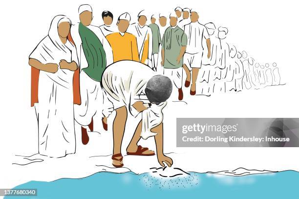 gandhi picking salt - gandhi march stock illustrations