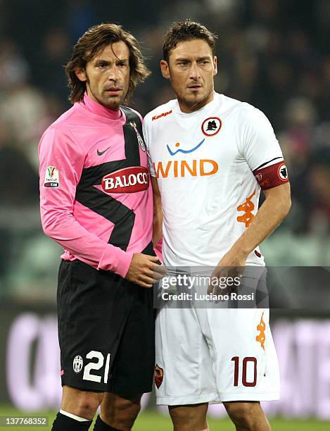 Andrea Pirlo of Juventus FC and Francesco Totti of AS Roma during the Tim Cup match between Juventus FC and AS Roma at Juventus Arena on January 24,...