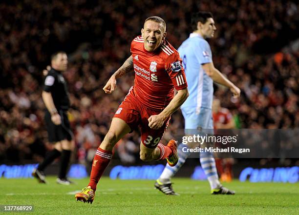 Craig Bellamy of Liverpool celebrates scoring his team's second goal during the Carling Cup Semi Final Second Leg match between Liverpool and...