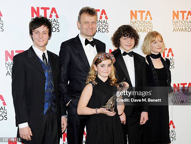 Winners of Situation Comedy Tyger Drew-Honey, Hugh Dennis, Ramona Marquez, Daniel Roche and Claire Skinner pose in front of the winners boards during...