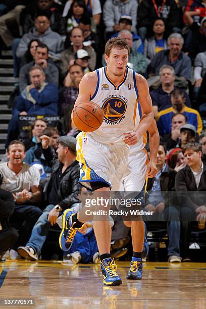 David Lee of the Golden State Warriors advances the ball up the court against the Memphis Grizzlies on January 23, 2012 at Oracle Arena in Oakland,...