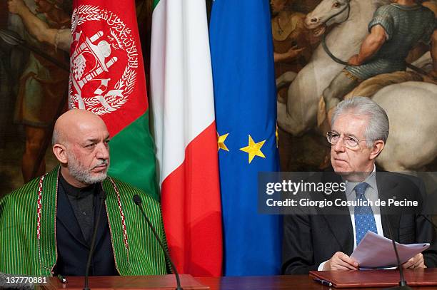 Afghan President Hamid Karzai and Italian Prime Minister attend a meeting to sign a bilateral agreement on cooperation and partnership, at Palazzo...