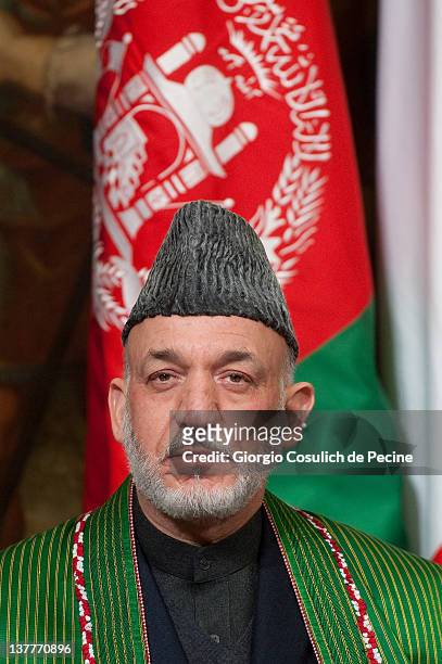 Afghan President Hamid Karzai attends a meeting with Italian Prime Minister to sign a bilateral agreement on cooperation and partnership, at Palazzo...