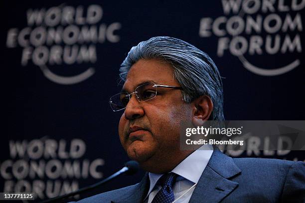 Arif M. Naqvi, founder and chief executive officer of Abraaj Capital Ltd. Of the United Arab Emirates , listens during a session on day two of the...