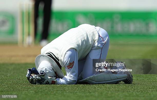 Tatenda Taibu of Zimbabwe reacts after missing a catch during day one of the test match between New Zealand and Zimbabwe at McLean Park on January...