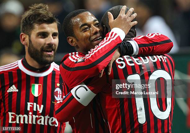 Milan team-mates Clarence Seedorf and Robinho celebrate a goal during the Tim Cup match between AC Milan and SS Lazio at Giuseppe Meazza Stadium on...