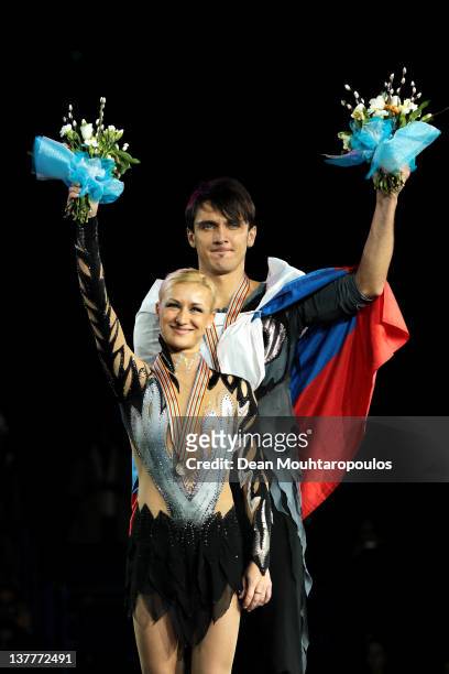Tatiana Volosazhar and Maxim Trankov of Russia celebrate winning the gold medal in the Pairs Free Skating during the ISU European Figure Skating...