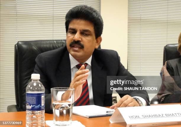 Pakistan's minister for minorities, Shahbaz Bhatti , listens to during a meeting of the US Commission on International Religious Freedom, a...