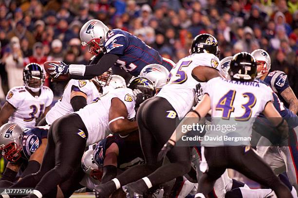 Championship: New England Patriots Tom Brady in action, diving over pile for touchdown vs Baltimore Ravens at Gillette Stadium. Foxborough, MA...