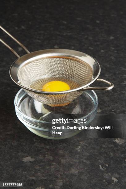 making the perfect poached egg - sieve stock pictures, royalty-free photos & images