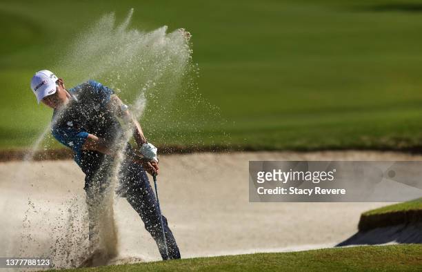 Sangmoon Bae of South Korea hits from a greenside bunker on the second hole during the first round of the Puerto Rico Open at Grand Reserve Golf Club...