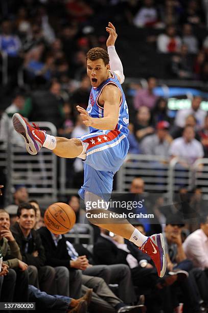 Blake Griffin of the Los Angeles Clippers leaps for the loose ball during the game against the Memphis Grizzlies at Staples Center on January 26,...
