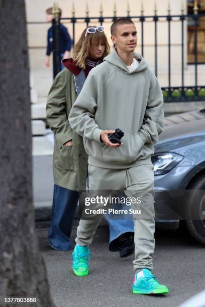 Romeo Beckham and Mia Regan are seen avenue Montaig on March 03, 2022 in Paris, France.