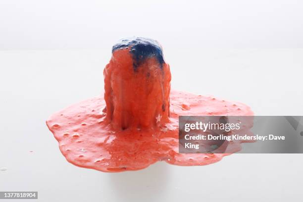 a foaming explosive jar volcano - volcano experiment stock pictures, royalty-free photos & images