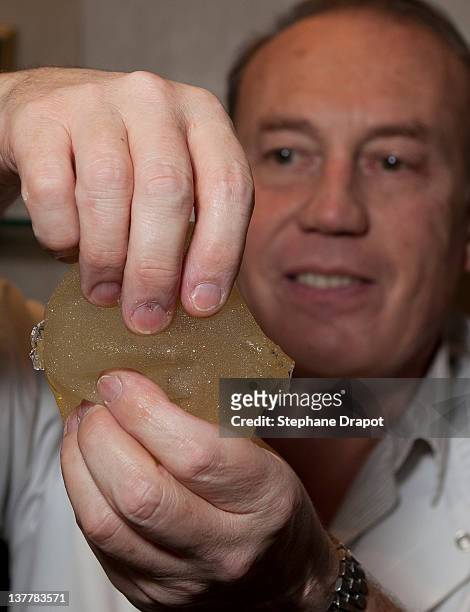 French Doctor, Denis Boucq , owner of the Clinic Mozart at Nice is showing scratched PIP implants on January 23, 2012 in Nice, France. French Doctor,...