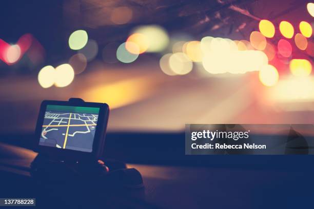 gps navigational system on dashboard of car - sirius imagens e fotografias de stock