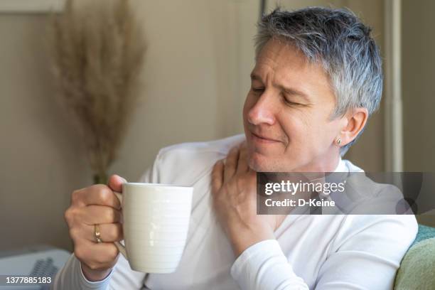 sore throat - throat pain stock pictures, royalty-free photos & images