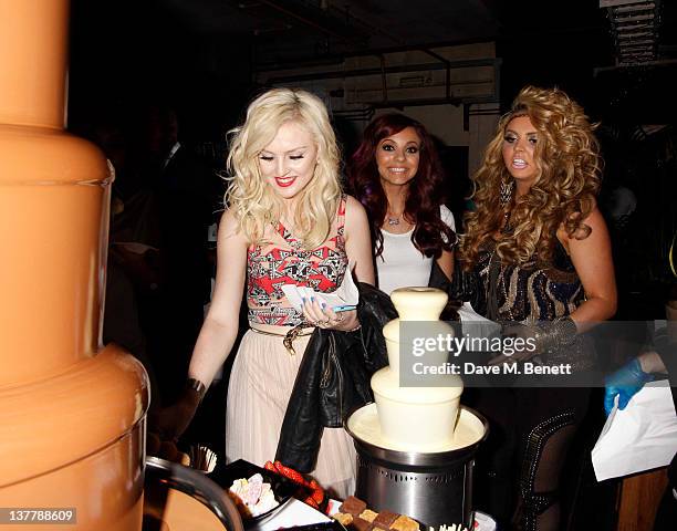 Perrie Edwards, Jade Thirlwall and Jesy Nelson of Little Mix attend the Raymond Weil Pre-Brit Awards Dinner hosted by Labrinth at Mosaica, The...