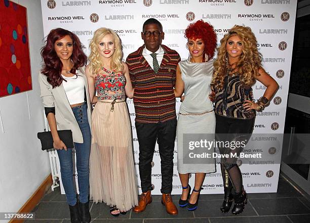 Jade Thirlwall, Perrie Edwards, Leigh-Anne Pinnock and Jesy Nelson of Little Mix pose with Labrinth as they attend the Raymond Weil Pre-Brit Awards...