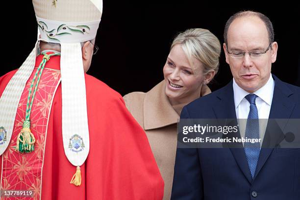 Princess Charlene of Monaco and Prince Albert II of Monaco attend the Ceremony Of The Sainte-Devote at the cathedrale Notre Dame on January 27, 2012...