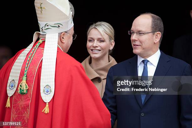 Princess Charlene of Monaco and Prince Albert II of Monaco attend the Ceremony Of The Sainte-Devote at the cathedrale Notre Dame on January 27, 2012...