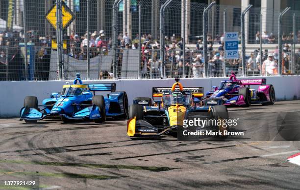 Pato O'Ward of Mexico and driver of the Arrow McLaren SP Chevrolet, Jimmie Johnson of United States and driver of the Caravana Chip Ganassi Racing...