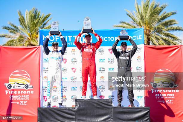 Second place finisher, Alex Palou of Spain and driver of the NTT DATA Chip Ganassi Racing Honda, Champion,Scott McLaughlin of New Zealand and driver...