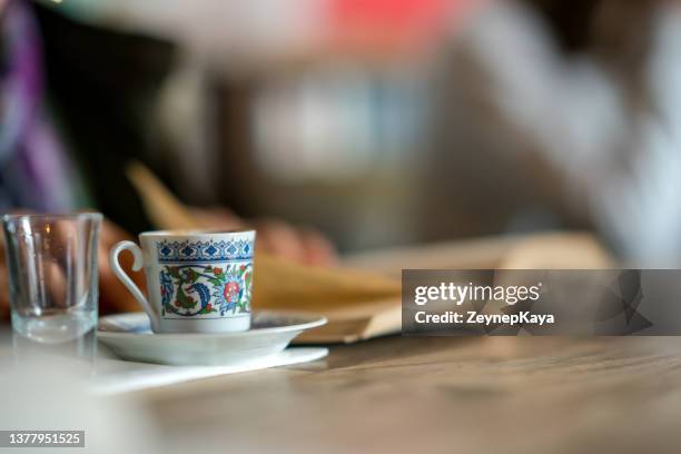 turkish coffee with book - turkish coffee stock pictures, royalty-free photos & images