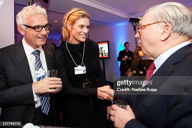 Urs Rohner, Credit Suisse Group AG vice chairman, Nadja Schildknecht, Zurich Film Festival co-founder and Hubert Burda attend the Burda DLD Nightcap...