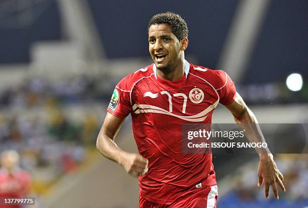 Tunisia's Issam Jemaa celebrates after scoring against Niger during the Africa Cup of Nations 2012 at the Friendship stadium in Libreville on January...