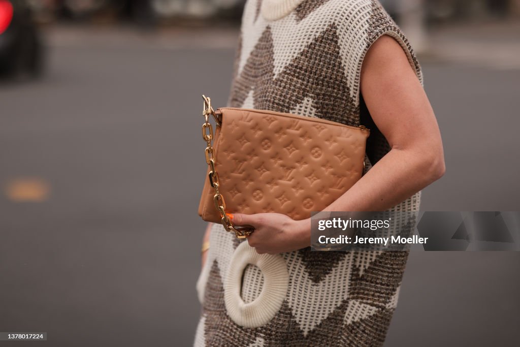 Sonia Lyson wearing Louis Vuitton beige Coussin leather bag, Louis