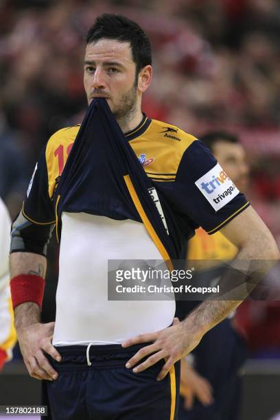 Iker Romero of Spain looks dejected after losing 24-25 the Men's European Handball Championship first semi final match between Denmark and Spain at...