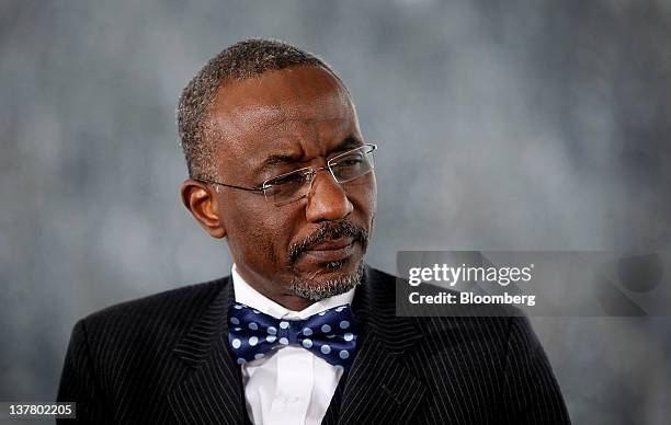 Lamido Sanusi, governor of the Central Bank of Nigeria, listens during a television interview on day three of the World Economic Forum in Davos,...