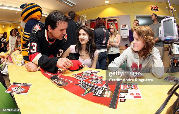 Former NHL Player Jason York visits with young patients at the unveiling of the NHL All-Star Legacy Playroom at Children's Hospital of Eastern...