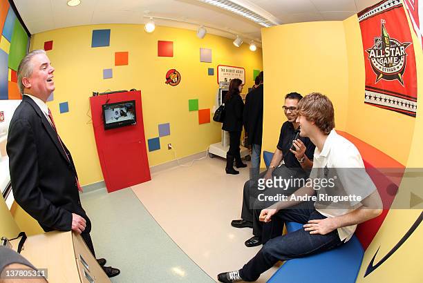 Sean Couturier of the Philadelphia Flyers teleconferences with a young patient at the unveiling of the NHL All-Star Legacy Playroom at Children's...